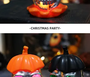 Macro detail of glowing skull and pumpkin LED candle lamps for Halloween decor