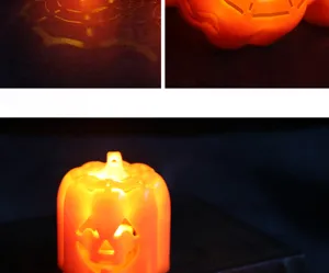 Detailansicht der leuchtenden LED-Kürbislampe mit Spinnennetz-Projektionseffekt