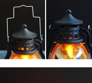Détail rapproché de la lanterne citrouille d'Halloween avec poignée et lumière chaude