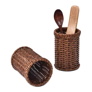 Rattan imitation kitchen utensil holder and cutlery storage basket for home organization.