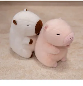 Cute capybara plush toy set, soft stuffed animal doll, lovely pink and white design for kids gift.
