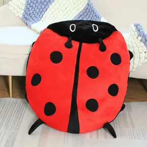 Cute ladybug plush pillow, soft stuffed toy cushion for sofa and home decoration use.