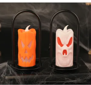 Pair of Halloween LED handheld candle lamps with pumpkin and skull decorative designs