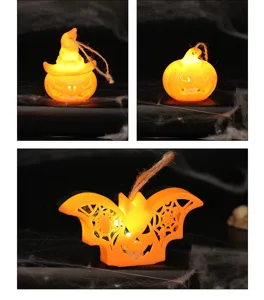 Detailed view of Halloween LED glowing lights in pumpkin, witch hat and bat shapes