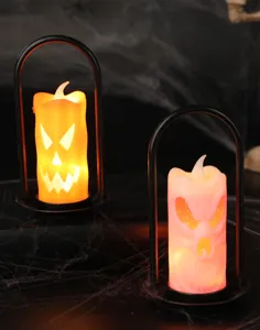 Spooky Halloween LED candle lights with pumpkin and skull designs in black frames