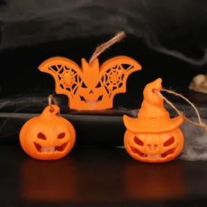 Set of three orange Halloween LED lights with pumpkin, witch hat and bat shapes.