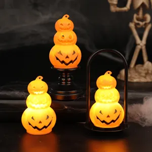 Glowing stacked pumpkin LED lights for Halloween scene decoration and spooky atmosphere