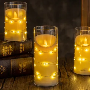 Flameless LED candles with string lights in glass cylinders for cozy home decor