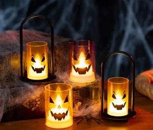 Warm glow Halloween LED pumpkin candle lights for spooky home party table decorations