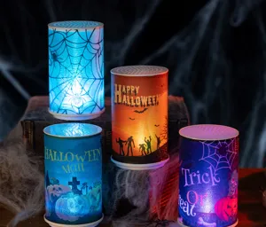 Four colorful Halloween LED cylinder candles with spooky silhouettes for home decor.