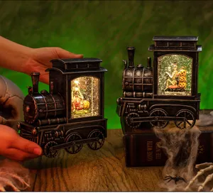 Vintage Halloween steam train snow globe lantern with skeleton and pumpkin scenes