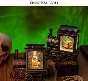 Detail of Halloween locomotive snow globe lantern with glowing skeleton scene
