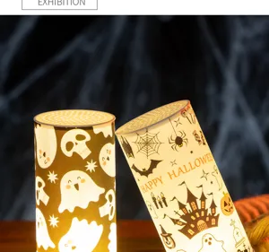 Warm glow Halloween electronic candle lamps with ghost and castle patterns.