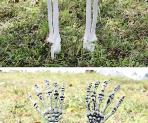 Detail van realistische skelet hand en voet grondpennen voor Halloween tuindecor