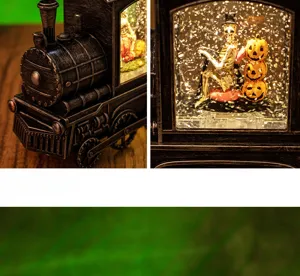 Close-up of skeleton and pumpkin figurines inside a Halloween locomotive water lantern