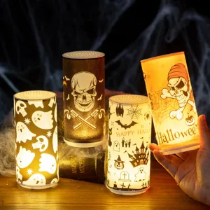 Atmospheric Halloween LED candles with skull and ghost patterns for festive decoration.