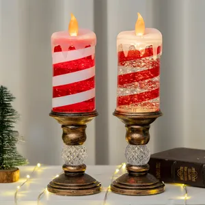 Candele LED ricaricabili a strisce su portacandele in bronzo vintage