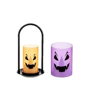 Decorative Halloween LED candle lamps featuring spooky monster faces for party decor