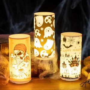 Set of three Halloween LED electronic candle lights with spooky patterns for home decor