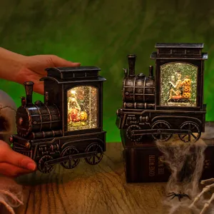 Vintage Halloween locomotive water lantern with swirling snow and skeleton pumpkin scene