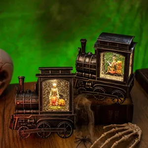 Vintage Halloween locomotive snow globe lantern with skeleton and pumpkin scenes