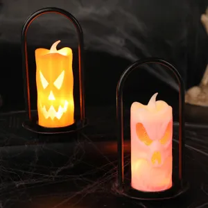 Halloween LED candle lanterns with pumpkin and skull designs in black frames