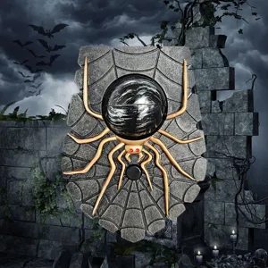 Detalle del timbre de Halloween aterrador con araña y ojo en una pared de ruinas