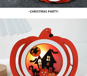 Detailed view of LED Halloween pumpkin lantern featuring a glowing haunted house scene