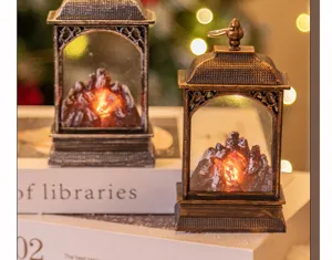 Gros plan de lanternes de cheminée LED vintage montrant les flammes vacillantes