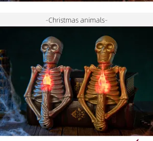 Dettaglio dei portacandele a forma di scheletro LED oro e argento per Halloween.