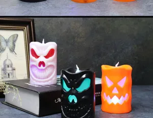 Atmospheric Halloween LED candles featuring glowing skull and pumpkin character designs