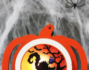 Close-up of Halloween pumpkin LED light decoration with spooky cat and bat silhouettes