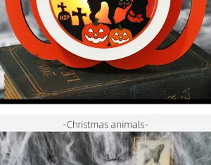 Close-up detail of a Halloween LED pumpkin light with black cat and spooky gravestone