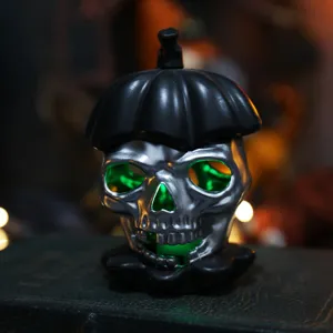 Halloween silver skull electronic candle light with green LED for spooky party decor