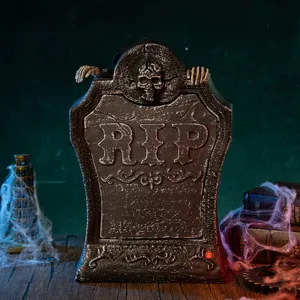 Lápida decorativa de Halloween con luces, calavera y manos de esqueleto