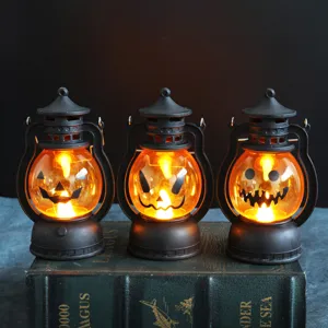 Lot de 3 lanternes de citrouille vintage d'Halloween avec lumières LED chaleureuses.