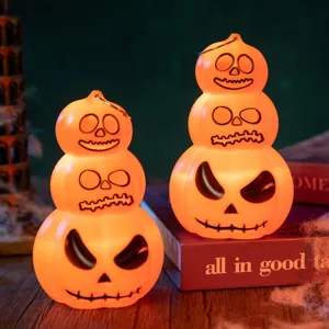 Lanternes de citrouille à LED d'Halloween à trois niveaux avec lueur chaude pour décoration.