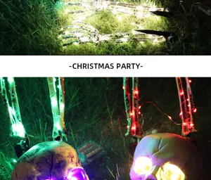 Detailed view of LED skeleton skulls and hands illuminated for Halloween garden decor