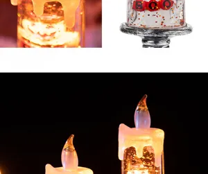 Close-up detail of Halloween LED candle light with glowing BOO text inside