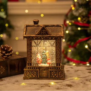 Lanterna natalizia vintage in bronzo con Babbo Natale, neve e luci LED calde soffuse