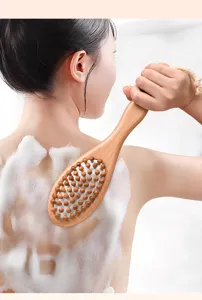 Natural wooden bath brush with massage nodes for deep body cleansing and back scrubbing use.