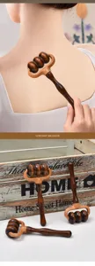 Wooden roller massager detail showing ergonomic handle and smooth rolling balls for back relief.