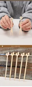 Spiedini di frutta in bambù usa e getta con simpatici disegni di scoiattolo e fiori per feste.