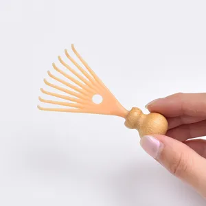 Masseur de tête à 9 griffes peigne de massage du cuir chevelu gratte-dos mini portable
