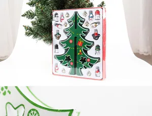 Detail view of wooden Christmas tree kit in packaging with various small ornaments