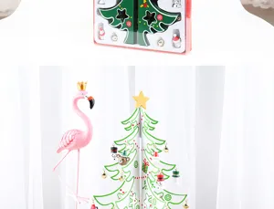 Detail of DIY wooden Christmas tree with ornaments in packaging and assembled view