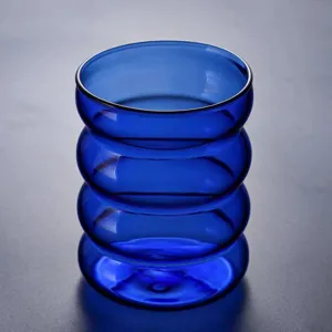 Blue ripple glass cup with stacked ring design, perfect for coffee, milk and daily home use.