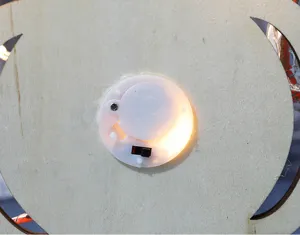 Close-up view of the LED light switch and battery compartment on Halloween decoration