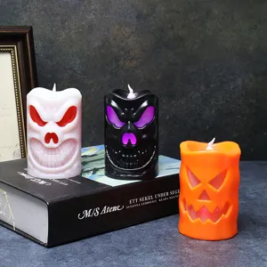 Decorative Halloween LED candles with pumpkin and skull faces for spooky festive parties