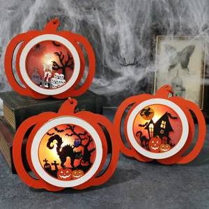 Set of three Halloween pumpkin LED lanterns with spooky skeleton and cat silhouettes